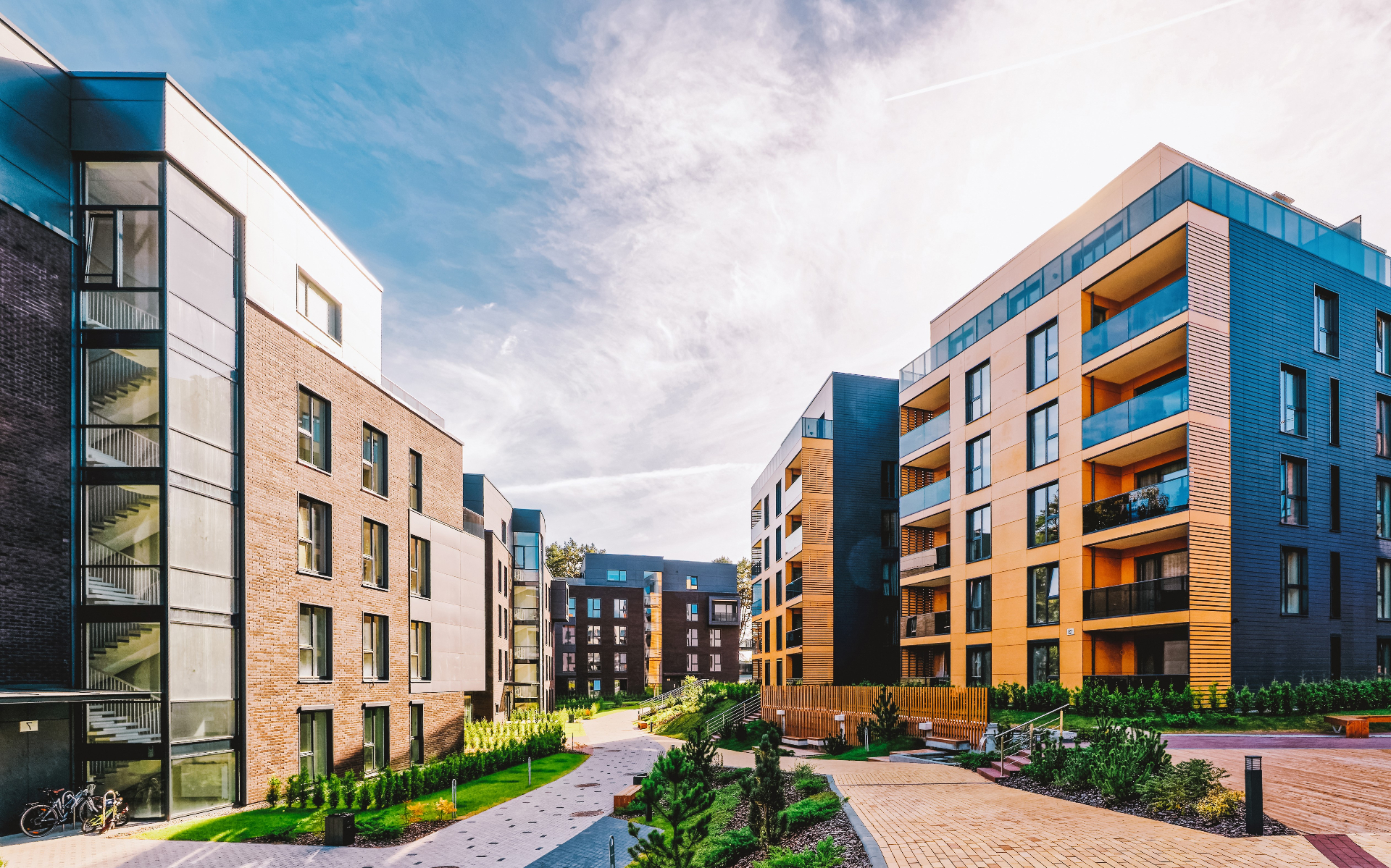 Modern Windermere estate residences with brick and wood facades and landscaped courtyard